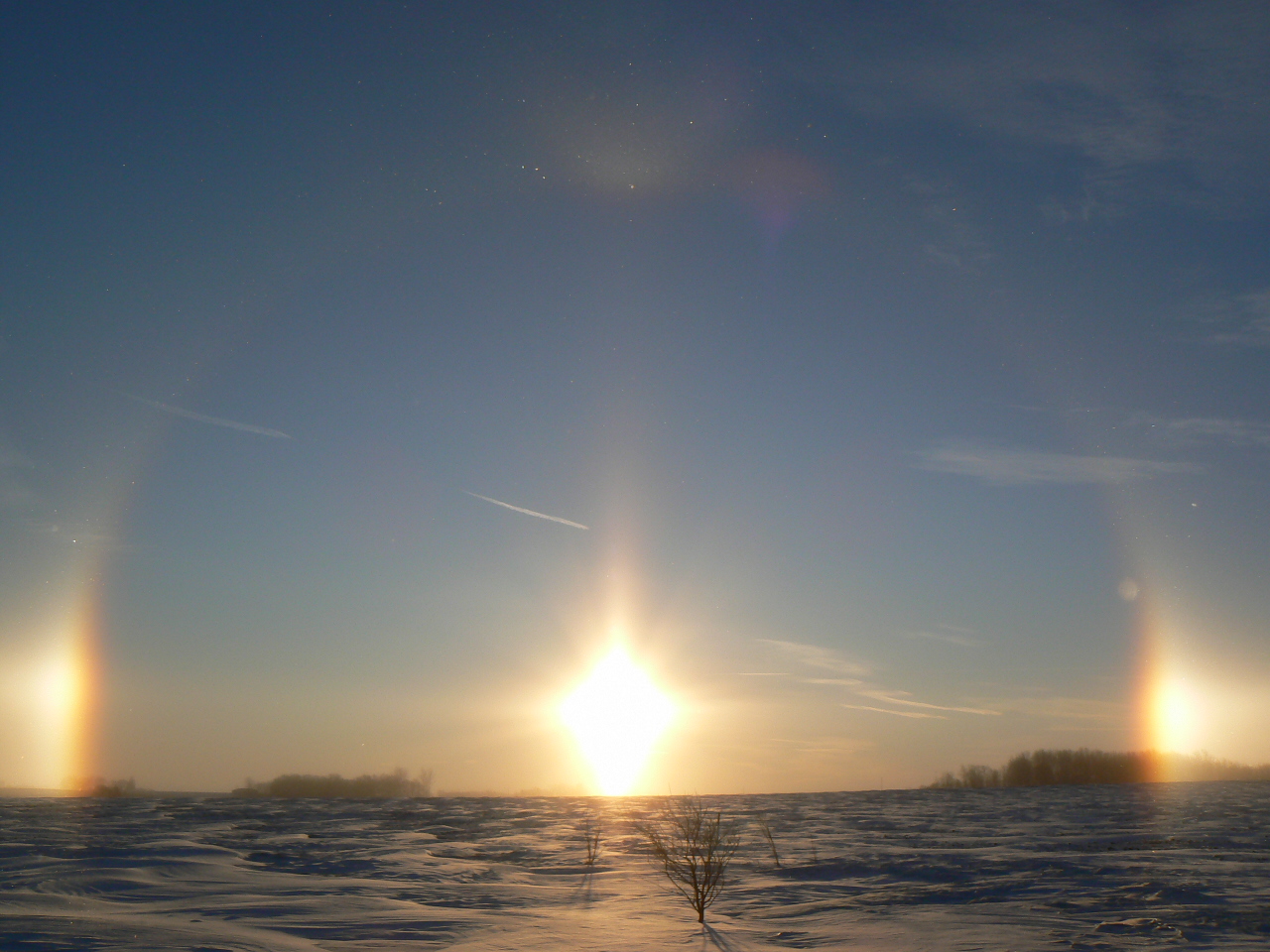 Jan 13, 2009. Sun halo & sundogs.