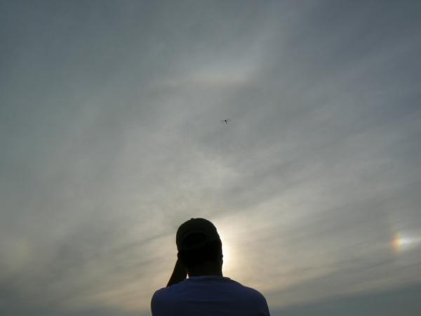 Aug 26, 2006, sun halo. Jay blocks the sun in this picture of a sun halo. Sundog on the right side of the photo.