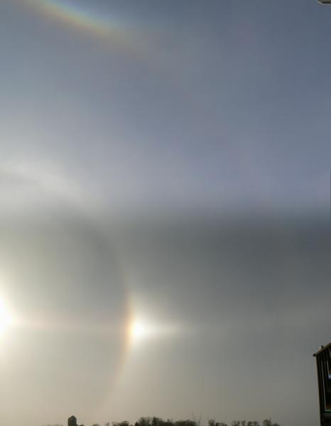 Dec 15, 2008. Sundog and a partial sun halo.