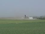 Strong winds and dust from bare fields.