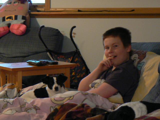 Little Girl seeks the shelter of Tom's lap during a storm.