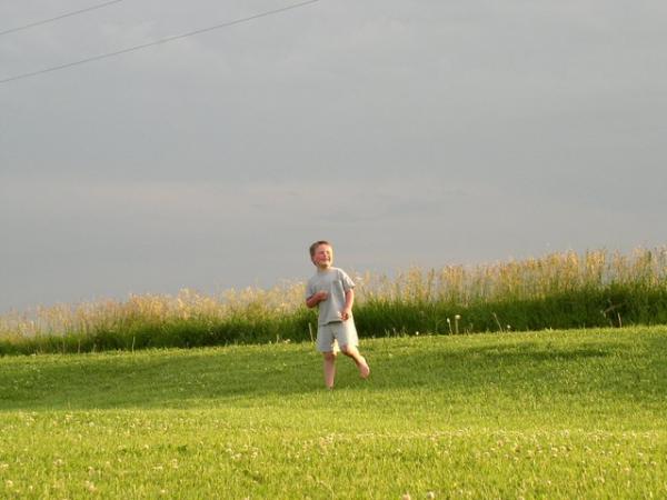 Tom loves his new yard, he just runs and runs.