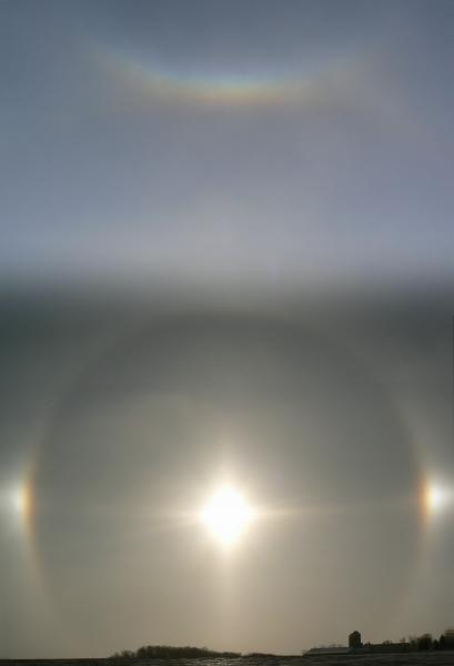 Dec 15, 2008. A sun halo, sundogs and a circumzenithal arc.