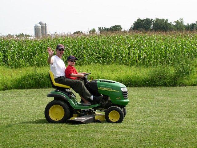 For those interested, Tom never rides the John Deere when it is mowing.
