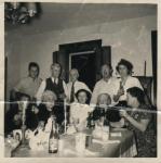 The Dining Room in the House on Cook Road. Dad is on the left in the back row, Grandpa and Grandma are to the right in the back 